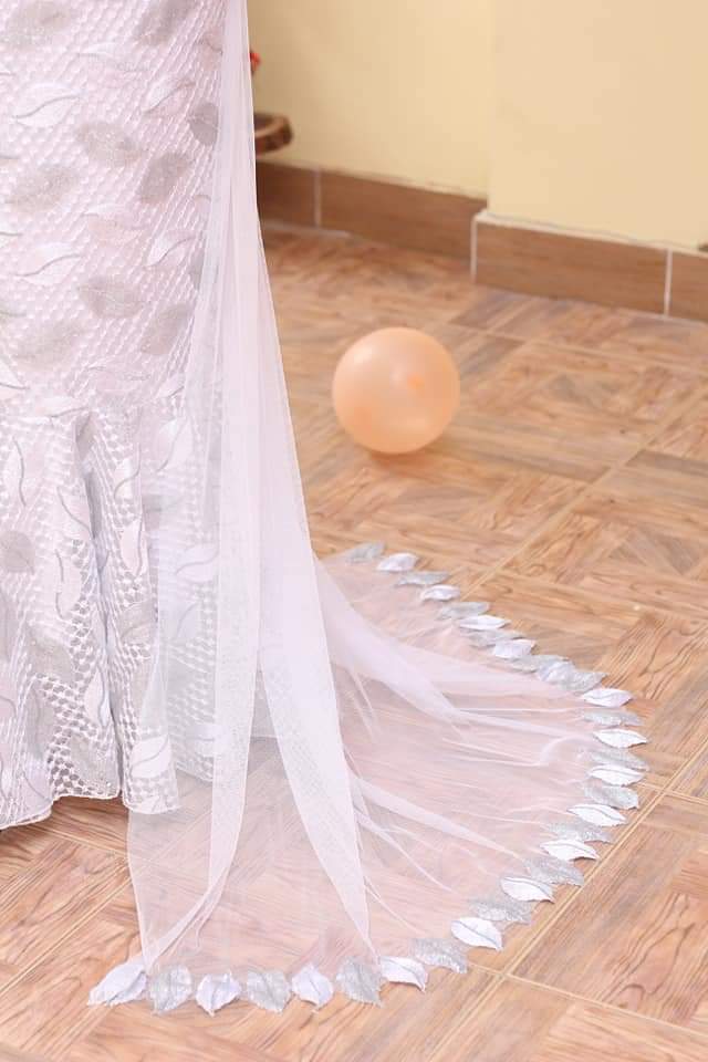 Soiree dress with tulle cape